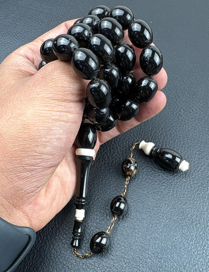 مسباح مرجان اسود طبيعي معشق بالعاج (يسر)