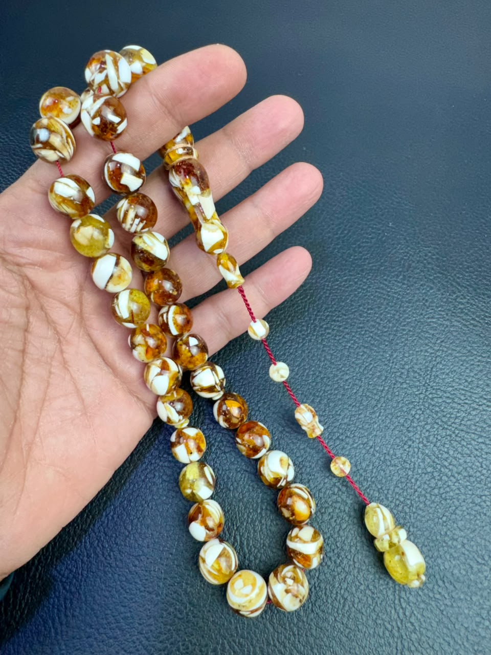 مسباح الكهرمان والعاج الطبيعي