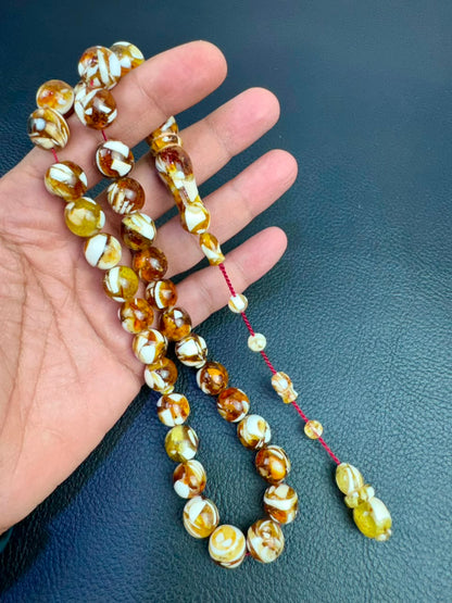 مسباح الكهرمان والعاج الطبيعي