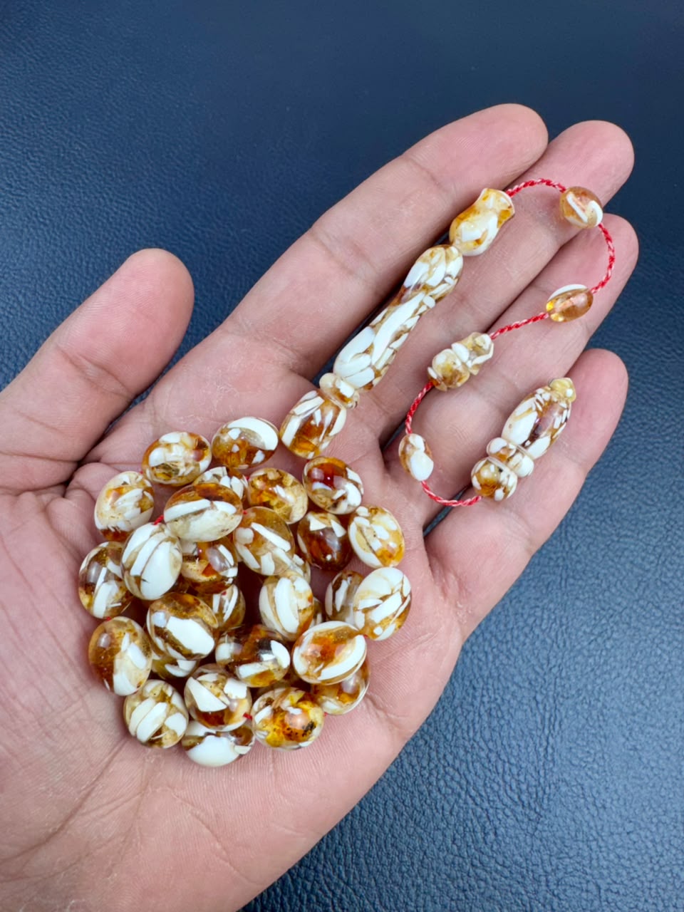 مسباح الكهرمان والعاج الطبيعي